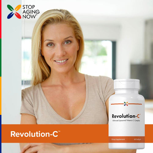 View 7 Woman holding a bottle of Revolution-C supplement with 'Stop Aging Now' branding.