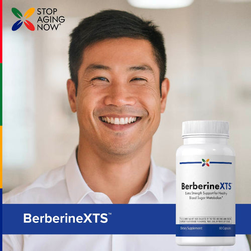 View 8 Man smiling with a bottle of BerberineXTS supplement in front of him, featuring the 'Stop Aging Now' brand.