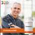 Middle-aged man smiling while working out next to a Cholesterol360 bottle.