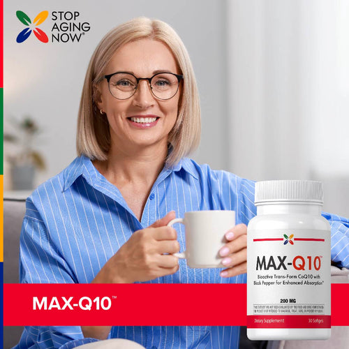 View 7 A middle-aged woman smiles while holding a mug next to a MAX-Q10 bottle.