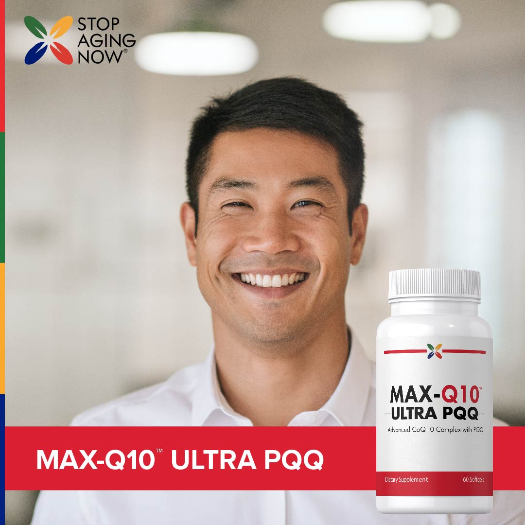 A smiling man in his 30s-40s holds a MAX-Q10 ULTRA PQQ bottle.