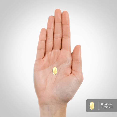 View 2 A softgel capsule displayed on a scale measures 0.645 inches or 1.638 centimeters in size.
